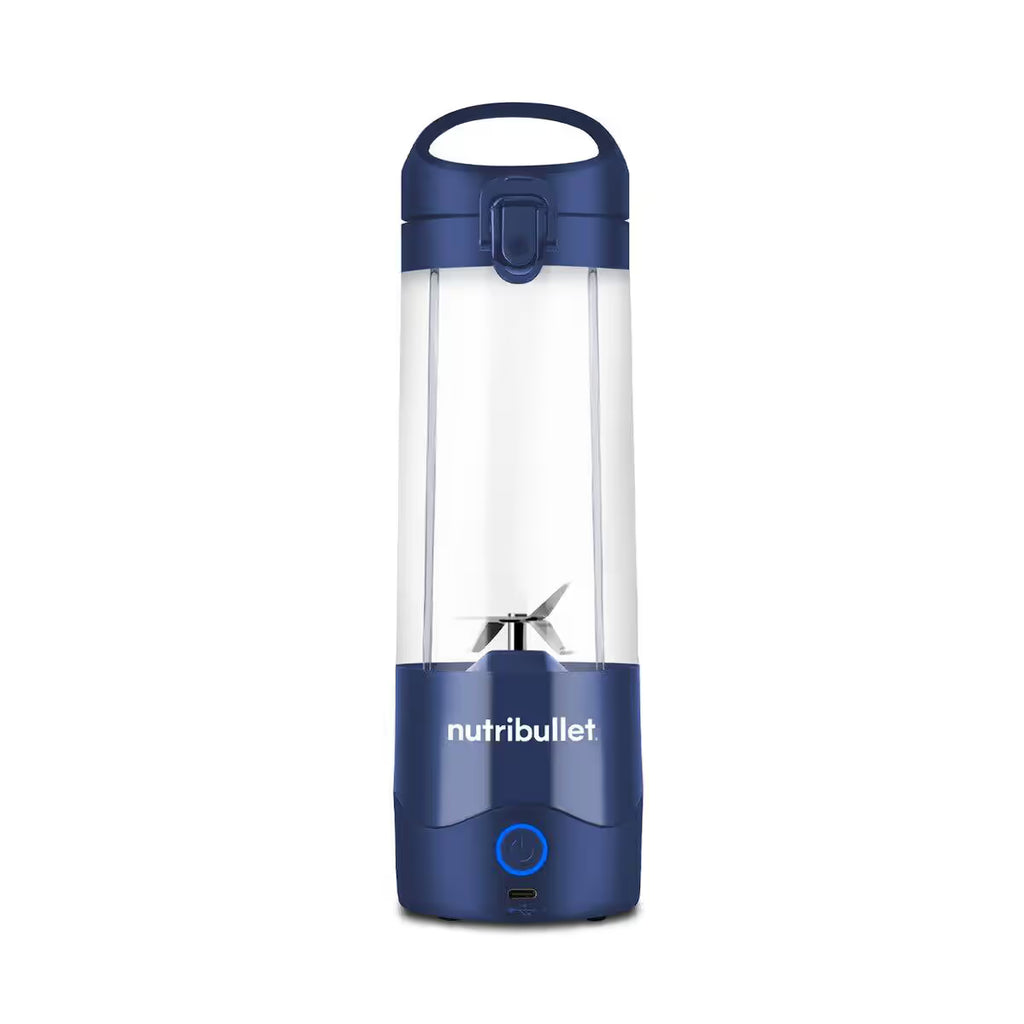 Vista frontal de la licuadora portátil Nutribullet Portable azul de 16oz vacía, mostrando las cuchillas de acero y el botón iluminado - Ferretería La Palma - 1690100