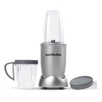 Licuadora personal Nutribullet Original 600W en color plateado mostrando los vasos y la tapa vacíos sobre fondo blanco - Ferretería La Palma - 1690080