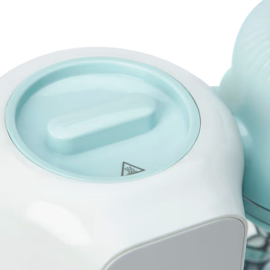 Primer plano de la tapa de seguridad del depósito de agua de la Nutribullet Baby Steam y Blend con indicador de advertencia de calor - Ferretería La Palma - 1690018