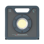 Vista frontal del reflector led industrial Scangrip NOVA 12 mostrando su potente panel de luz central sobre fondo blanco - Ferretería La Palma - 1870005