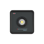 Vista frontal del reflector LED compacto industrial Scangrip NOVA 2 CONNECT mostrando su lente central COB sobre fondo blanco - Ferretería La Palma - 1870008