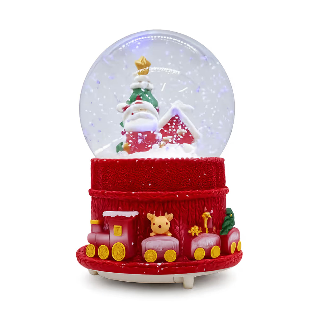 Vista frontal de la bola de nieve musical navideña Starlights Santa Claus con base ornamentada con tren y vagones con regalos sobre fondo blanco - Ferretería La Palma - 1800000