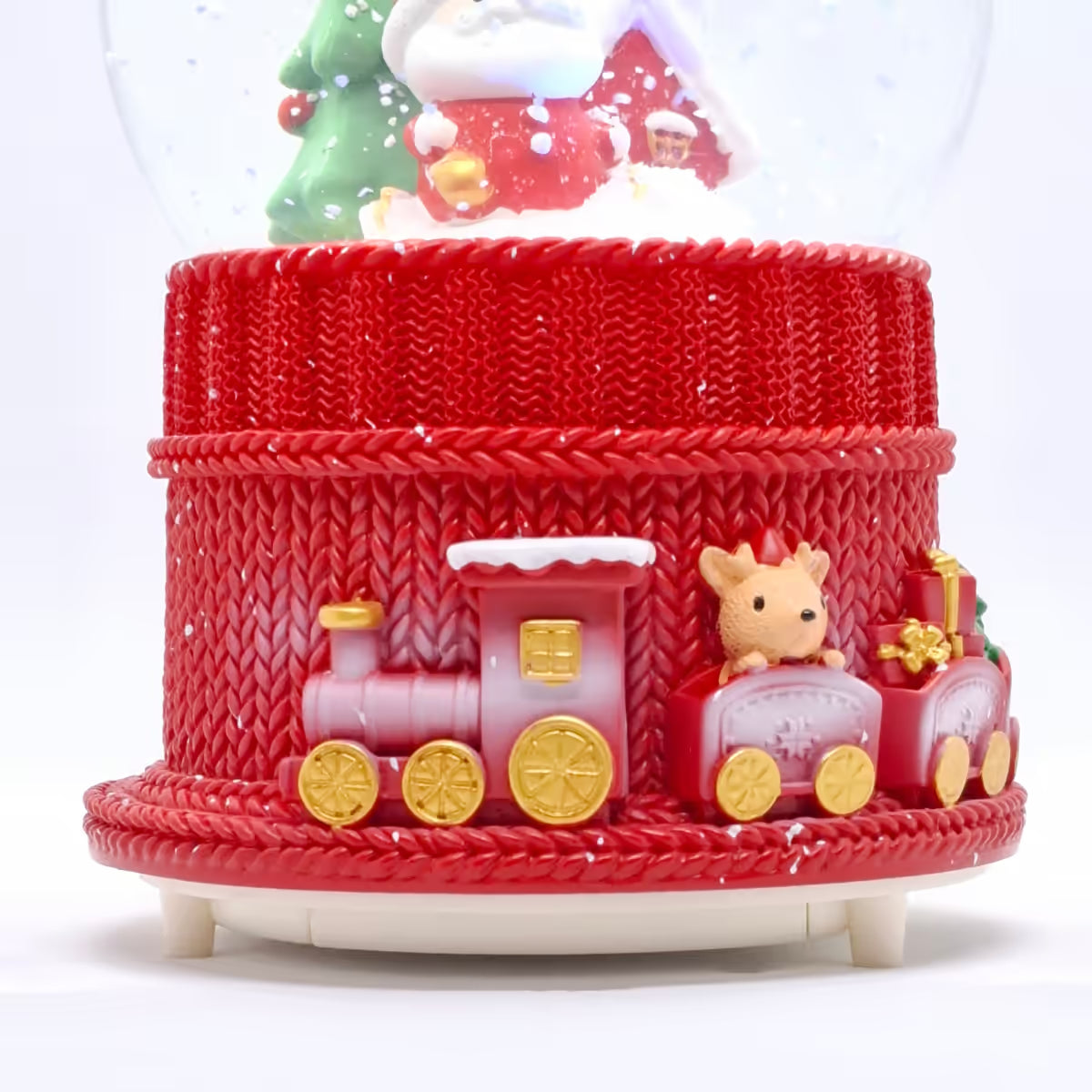 Primer plano de la base con tren y vagones con regalos de la bola de nieve  navideña Starlights Santa Claus - Ferretería La Palma - 1800000