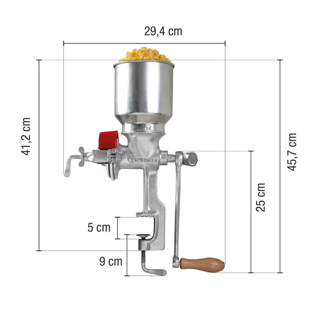 Diagrama de especificaciones técnicas con medidas detalladas del molino de granos manual Victoria con tolva alta. Incluye una altura total de 45.7 cm, ancho de 29.4 cm y apertura de prensa de sujeción de 5 cm. Producto fabricado en hierro fundido estañado, código 1040006 - Ferretería La Palma.