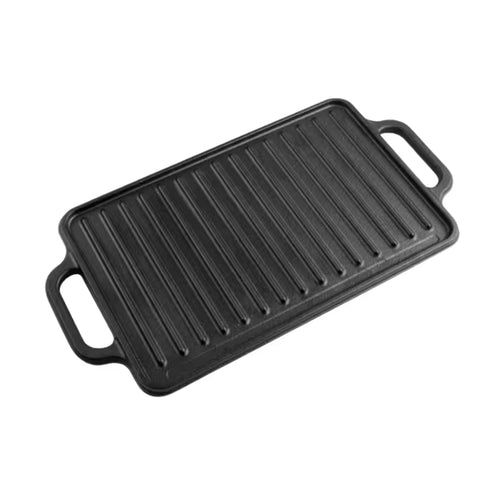 Vista en perspectiva de la cara estriada tipo grill de la plancha reversible Victoria de 33x21 cm en hierro fundido curado con doble asa lateral - Ferretería La Palma - 1050091