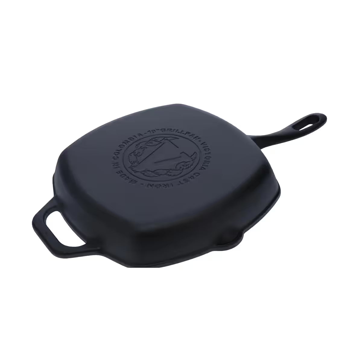 Vista posterior del sartén grill cuadrado Victoria de 25 cm en hierro fundido esmaltado resaltando el sello de marca grabado en la base - Ferretería La Palma - 1050027
